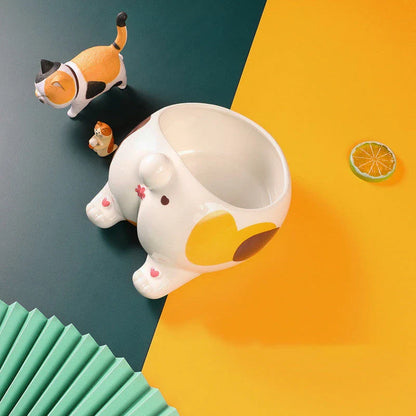 Ceramic pet bowl with unique cartoon cat ass design for comfortable feeding
