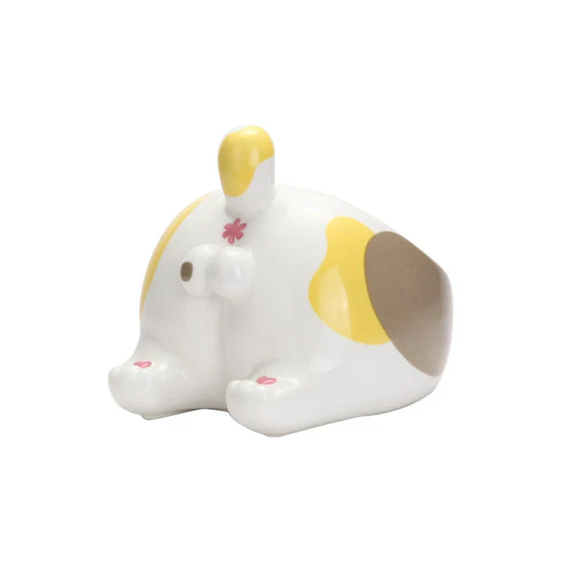 Ceramic pet bowl with unique cartoon cat ass design for comfortable feeding