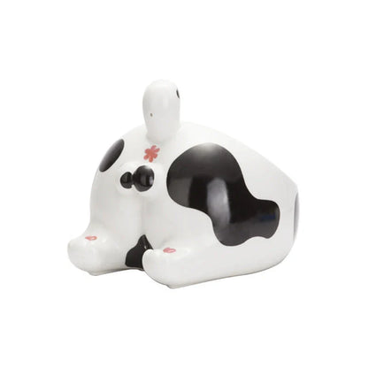 Ceramic pet bowl with unique cartoon cat ass design for comfortable feeding