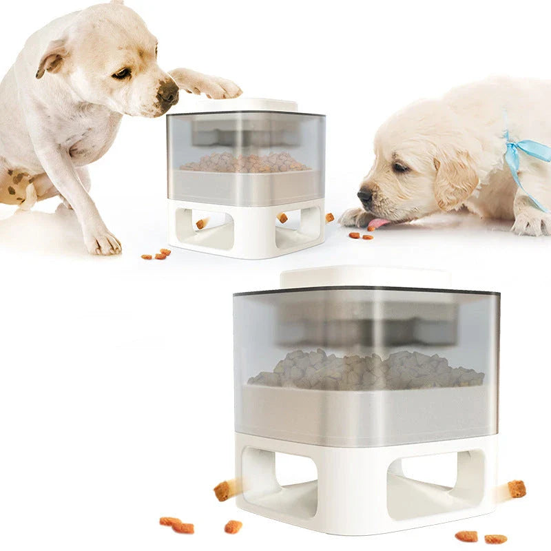 Interactive dog food feeder with anti-slip base in white and yellow
