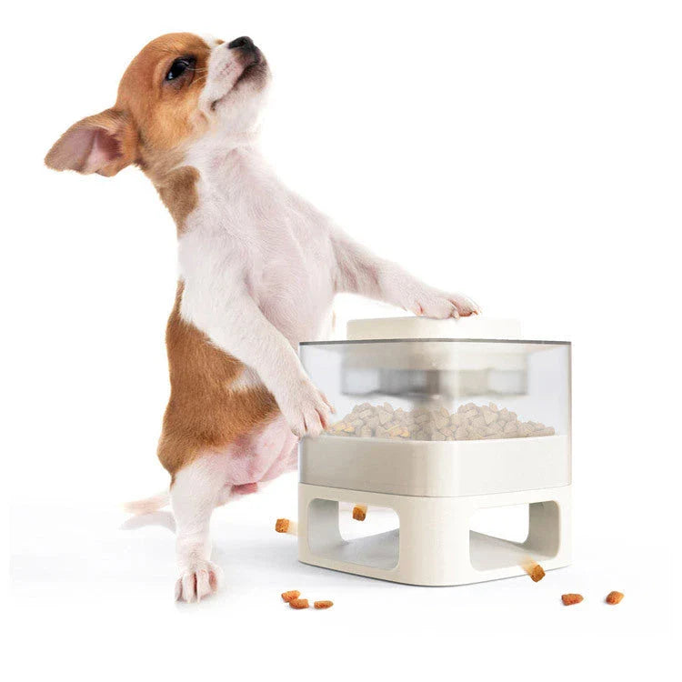 Interactive dog food feeder with anti-slip base in white and yellow