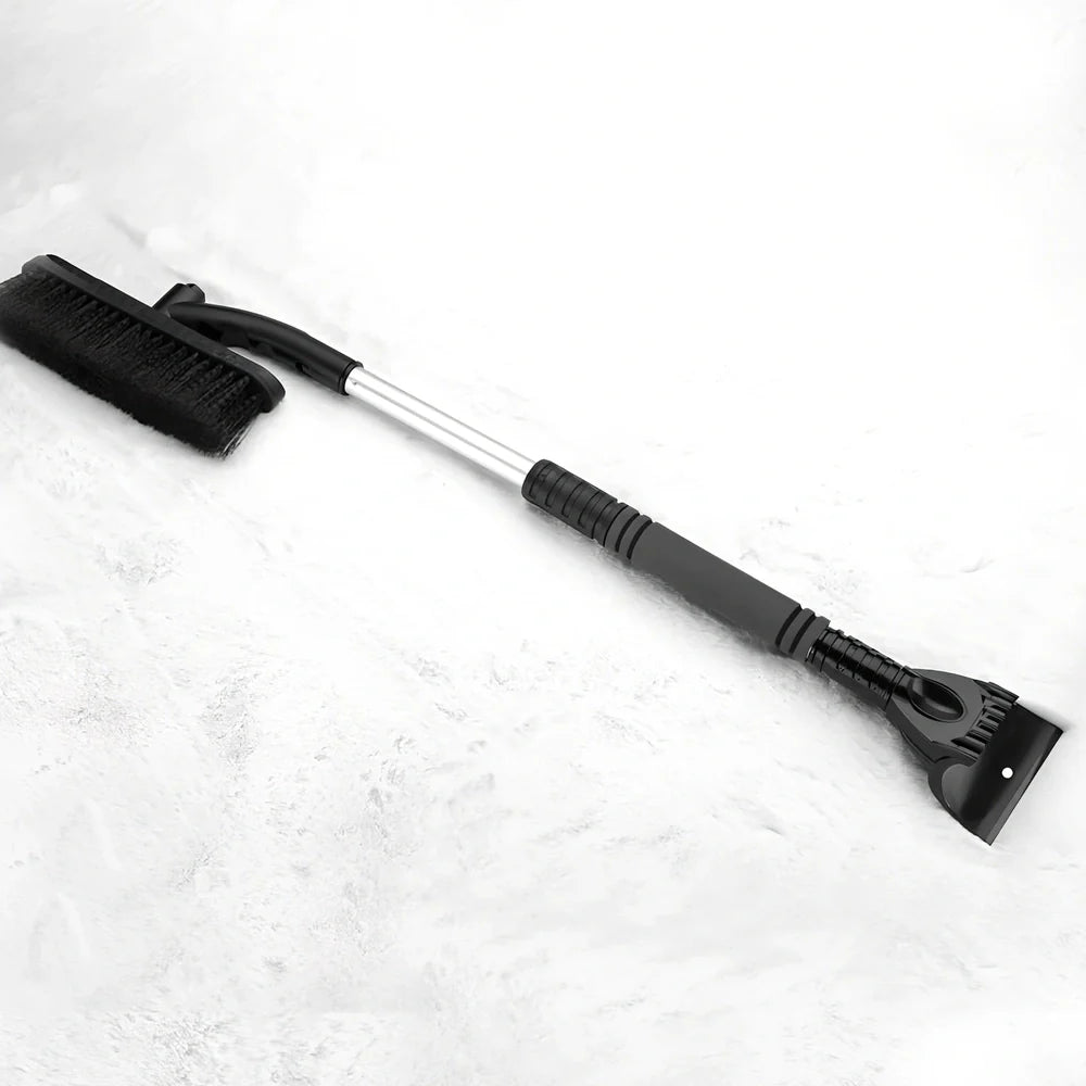 Black extendable car snow brush with orange ice scraper detached, 80cm length for windscreen cleaning