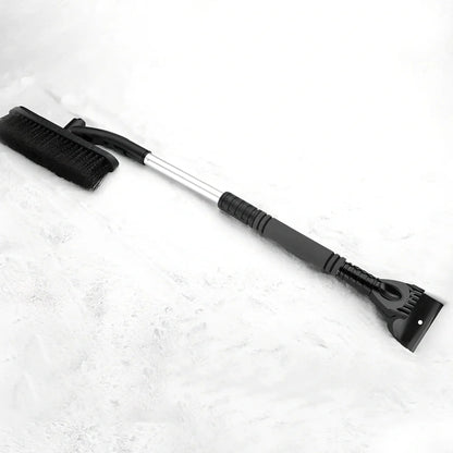 Black extendable car snow brush with orange ice scraper detached, 80cm length for windscreen cleaning