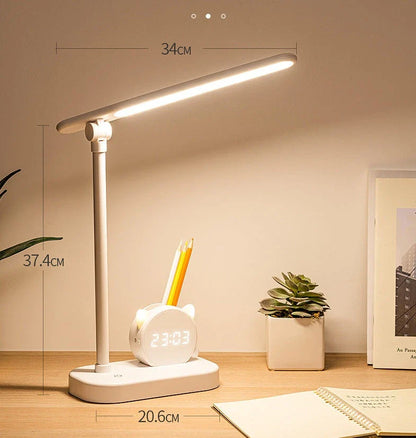 LED desk lamp with clock, USB charging, and pen holder in sleek design