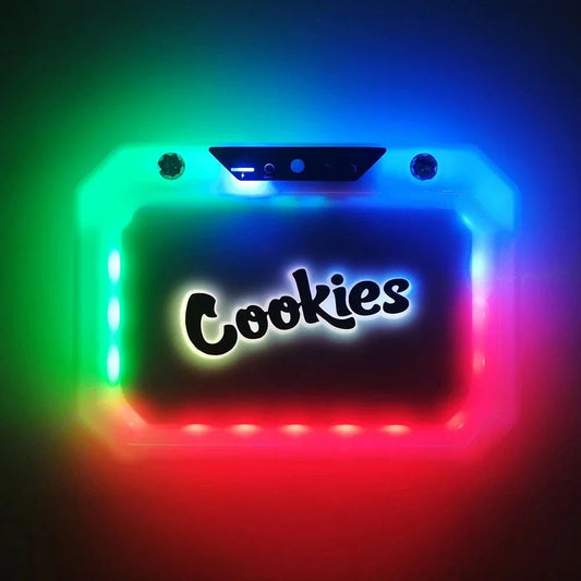 Stylish LED Cigarette Storage Tray with Color-Changing Lights: Durable acrylic construction, mesmerizing LED lighting, and convenient storage for rolling supplies.