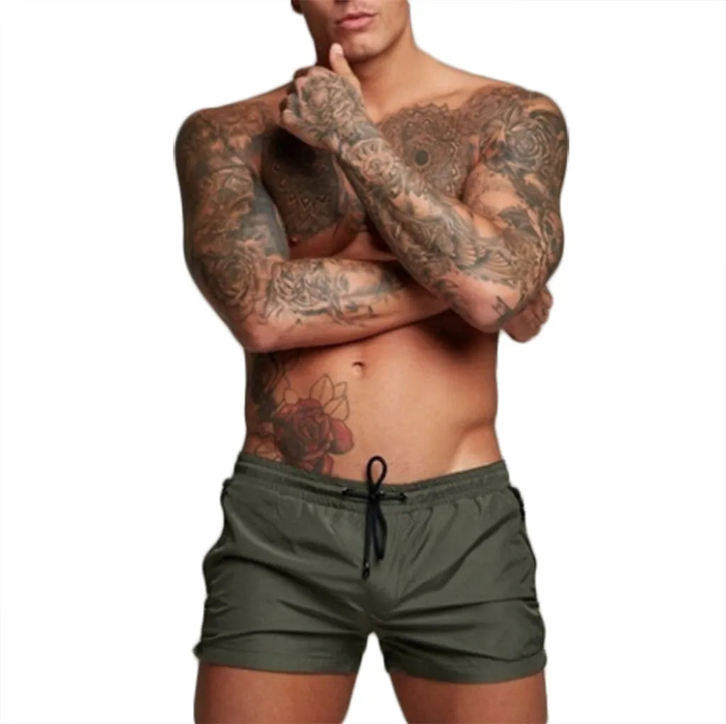 Breathable waterproof sports casual shorts in nylon cotton blend, available in red, black, green, blue, sizes M to 3XL