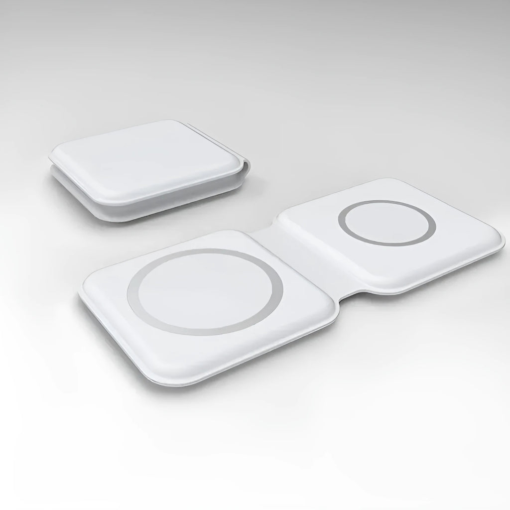 White foldable magnetic wireless charging dock showing two phones charging simultaneously at an angle.
