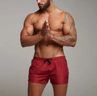 Breathable waterproof sports casual shorts in nylon cotton blend, available in red, black, green, blue, sizes M to 3XL