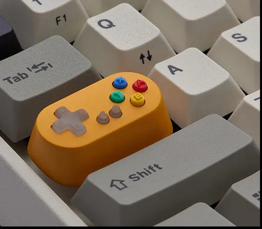 Wireless mechanical keyboard switch with metal transparent keycap in blue colour and game console handle design