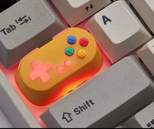 Wireless mechanical keyboard switch with metal transparent keycap in blue colour and game console handle design
