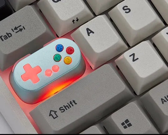 Wireless mechanical keyboard switch with metal transparent keycap in blue colour and game console handle design