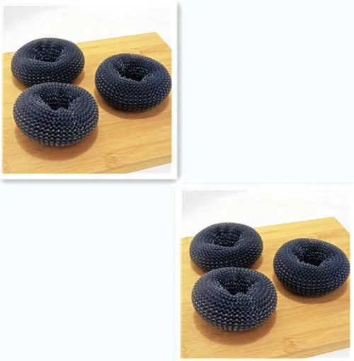 Kitchen cleaning brush with push-button soap dispenser and scrubber head.