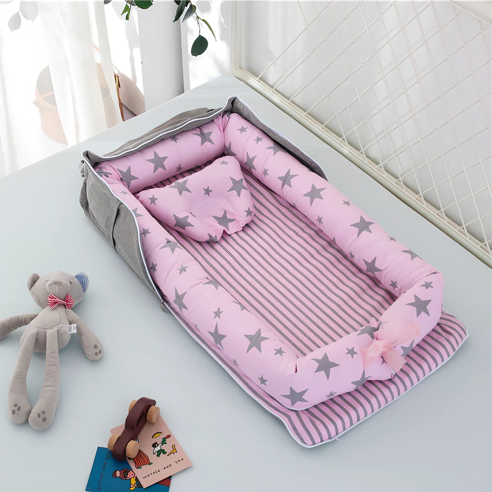 Foldable cotton portable baby crib in Animal World Blue, 90x50 cm with pillow and strap, weighing 1.3 kg