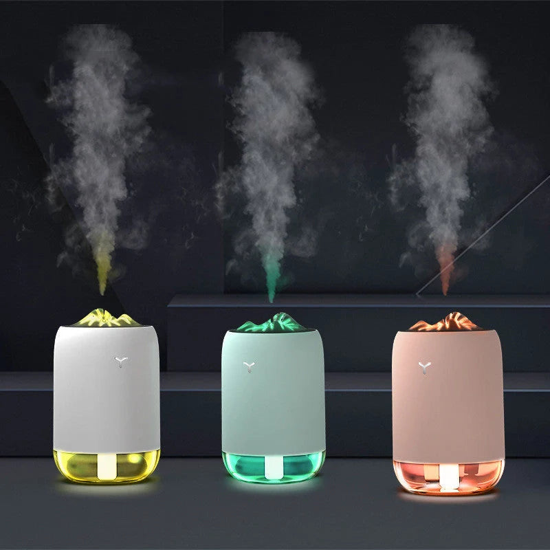 Magic Flame Humidifier in white, light blue, and pink, compact ultrasonic humidifier for small spaces