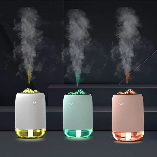 Magic Flame Humidifier in white, light blue, and pink, compact ultrasonic humidifier for small spaces