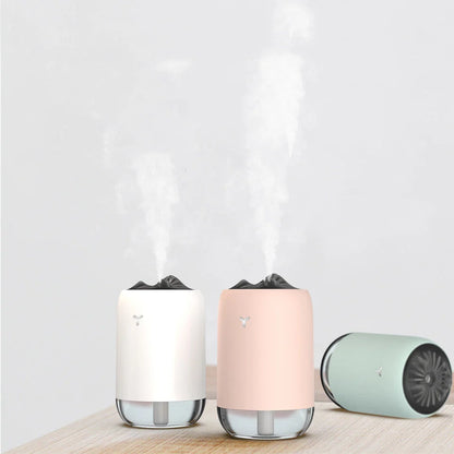 Magic Flame Humidifier in white, light blue, and pink, compact ultrasonic humidifier for small spaces
