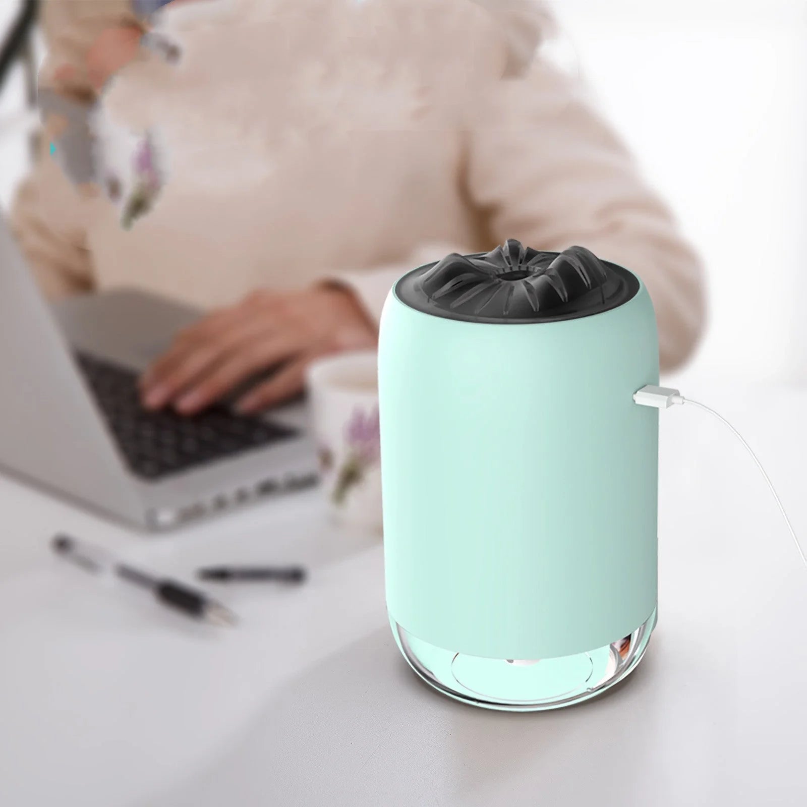 Magic Flame Humidifier in white, light blue, and pink, compact ultrasonic humidifier for small spaces