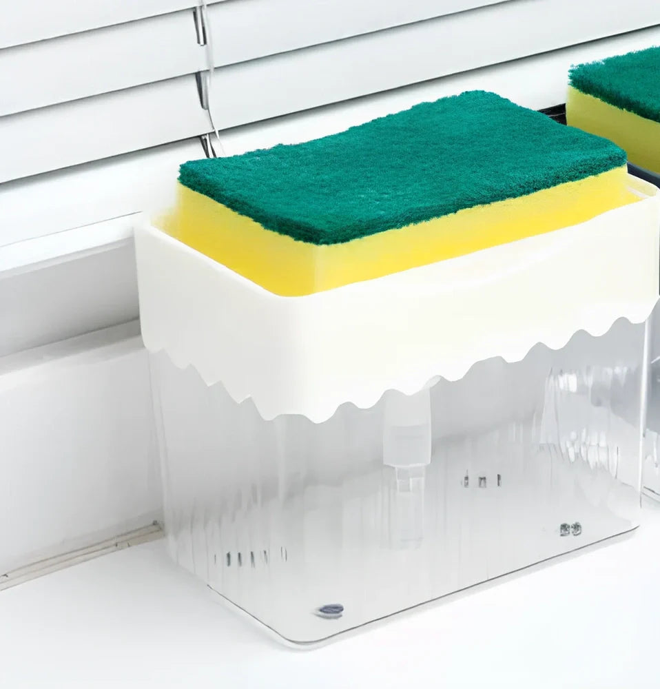 Dark blue 2-in-1 soap dispenser and sponge caddy unit on kitchen counter with measuring tape showing 13.5cm diameter