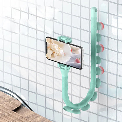 Flexible phone holder with suction cup for desktops and bicycles in black, pink, and clear green