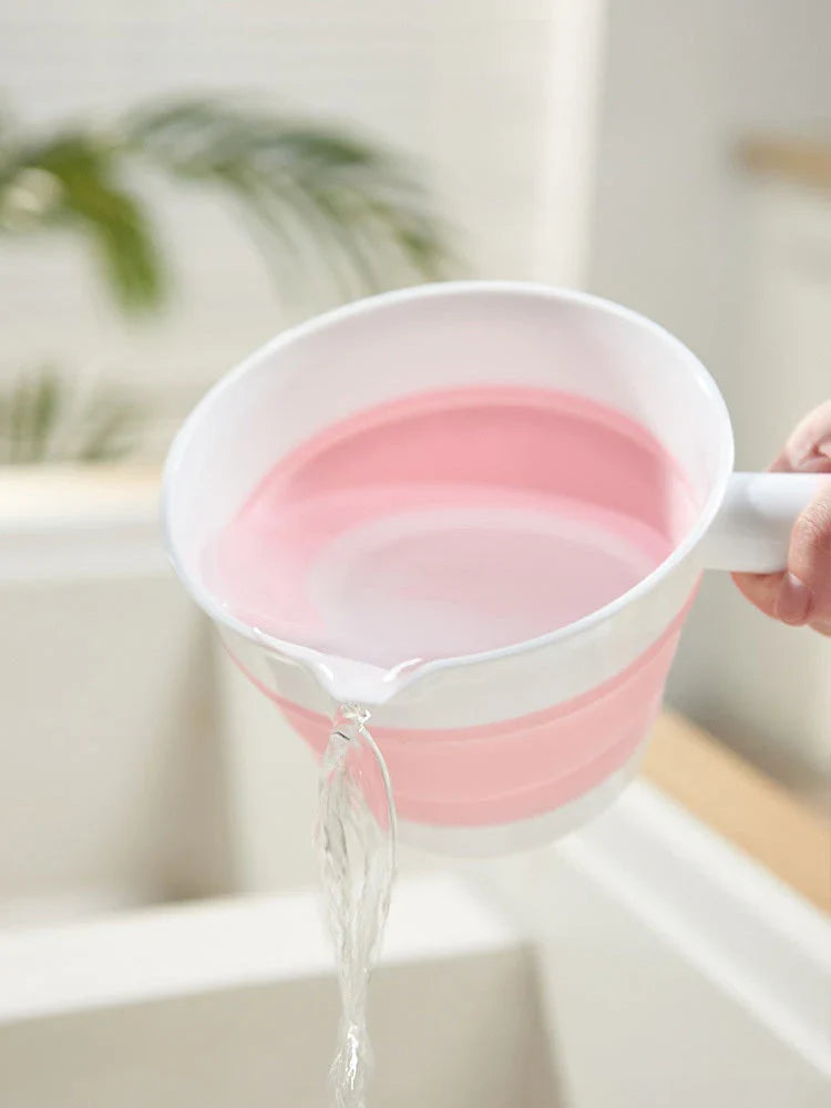 Folding portable collapsible bucket in grey and pink, perfect for outdoor and kitchen use