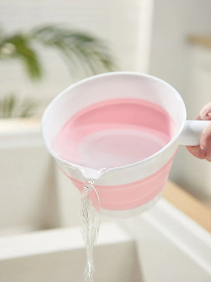 Folding portable collapsible bucket in grey and pink, perfect for outdoor and kitchen use