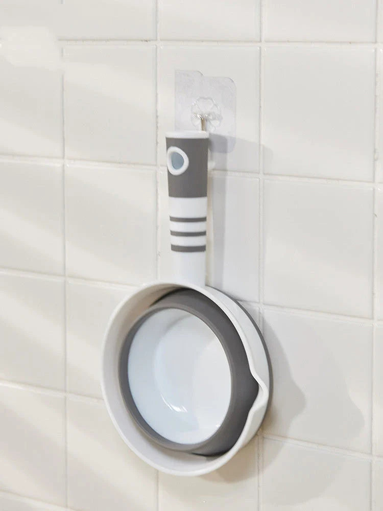 Folding portable collapsible bucket in grey and pink, perfect for outdoor and kitchen use