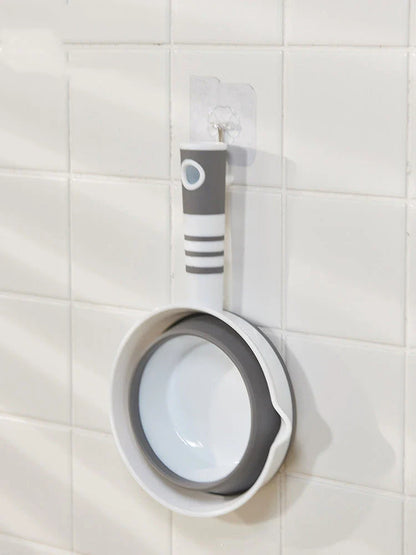 Folding portable collapsible bucket in grey and pink, perfect for outdoor and kitchen use