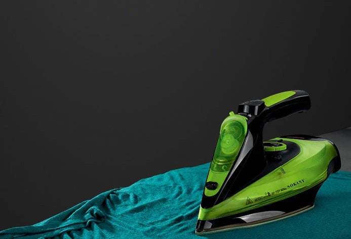 Cordless steam iron with ceramic soleplate and charging base, ideal for home and travel use
