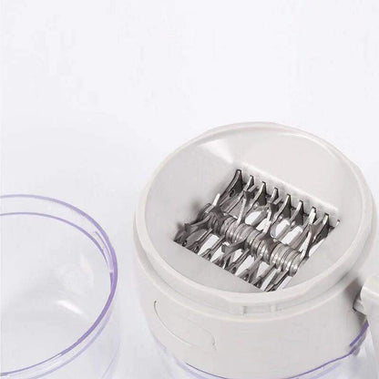 Manual nut grinder with stainless steel blades for chopping nuts and spices