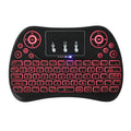 Compact black wireless keyboard with multi-colour backlit keys and integrated touchpad.