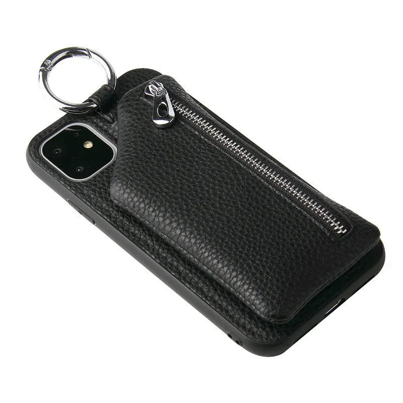 Pink imitation leather iPhone case with a crossbody neck lanyard and a visible card slot on the back.