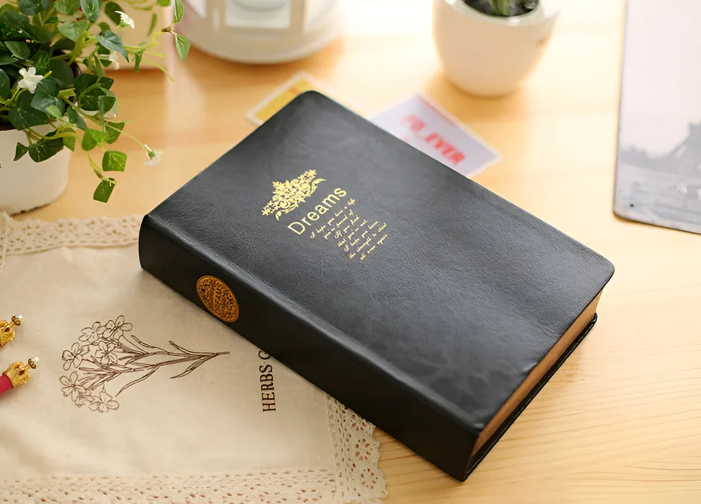 Jingu 25k Dream Super Thick Notebook with imitation leather cover, showing its 35mm depth.