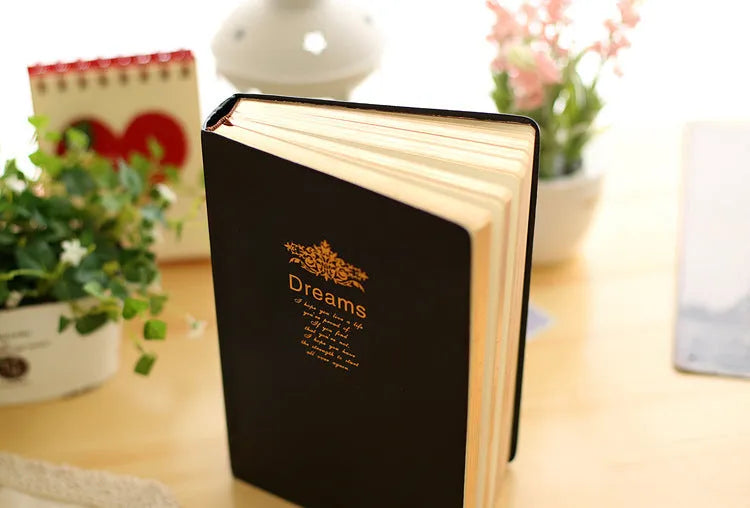 Jingu 25k Dream Super Thick Notebook with imitation leather cover, showing its 35mm depth.