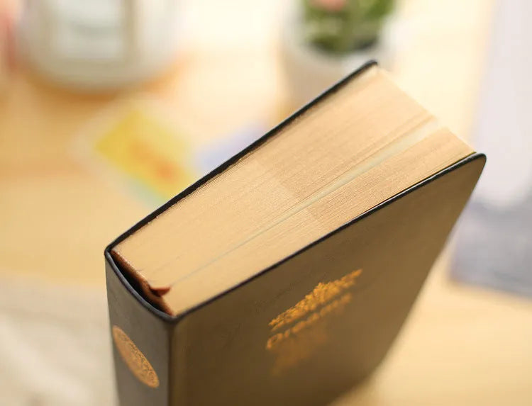 Jingu 25k Dream Super Thick Notebook with imitation leather cover, showing its 35mm depth.