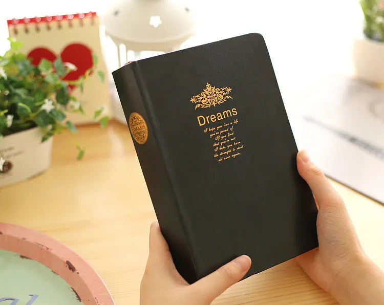 Jingu 25k Dream Super Thick Notebook with imitation leather cover, showing its 35mm depth.