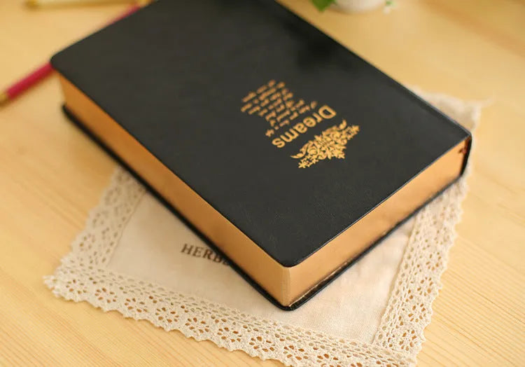 Jingu 25k Dream Super Thick Notebook with imitation leather cover, showing its 35mm depth.