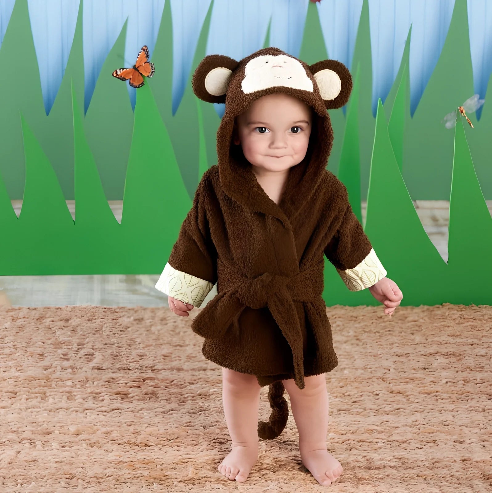 Cotton baby bathrobe with animal hood showing panda design, belt fastening, and absorbent fabric