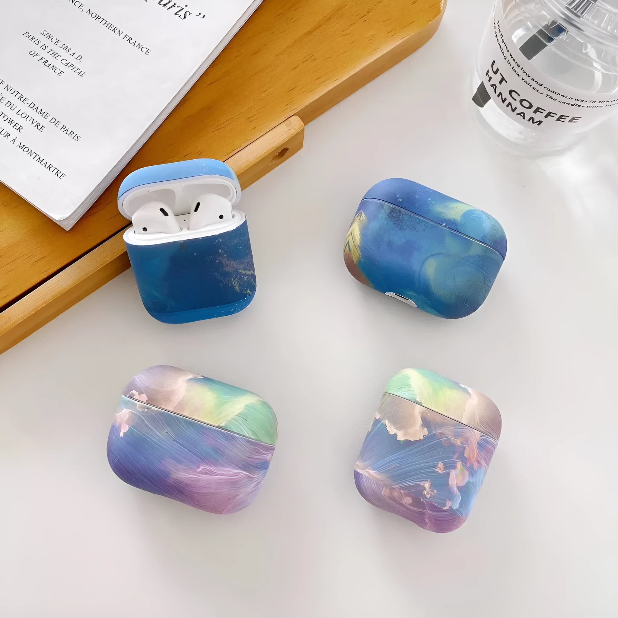 Pink and blue watercolour hard plastic protective case for Apple AirPods Pro and AirPods 1 2 charging cases.