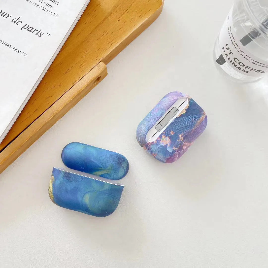 Pink and blue watercolour hard plastic protective case for Apple AirPods Pro and AirPods 1 2 charging cases.