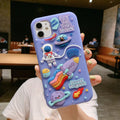 Purple silicone iPhone case with cartoon astronaut spaceman design showing precise port cut-outs