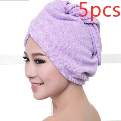 Absorbent microfiber hair turban in various vibrant colours, designed for fast and convenient drying