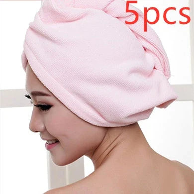 Absorbent microfiber hair turban in various vibrant colours, designed for fast and convenient drying