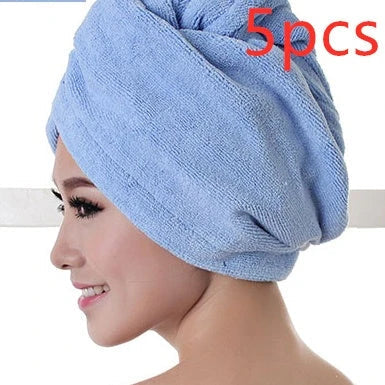 Absorbent microfiber hair turban in various vibrant colours, designed for fast and convenient drying