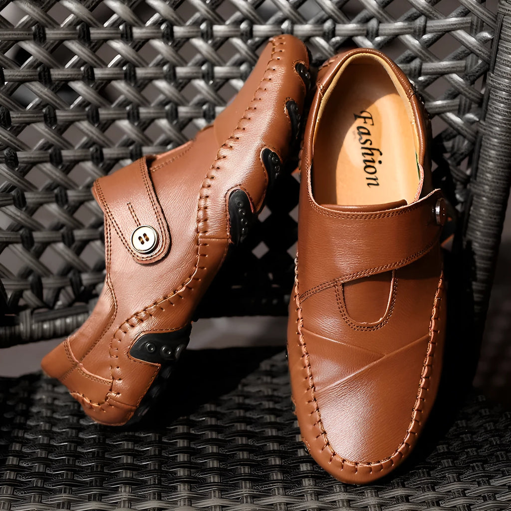 Men's brown casual lace-up leather shoes with round toe and flat heel on a plain background