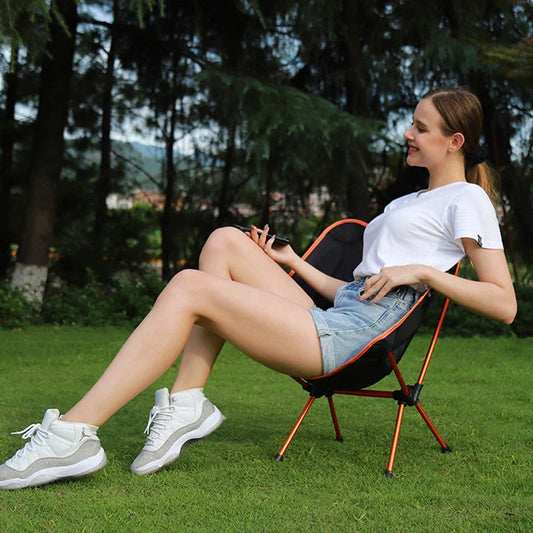 Ultralight outdoor folding camping chair in grey, blue, or red, with carry bag