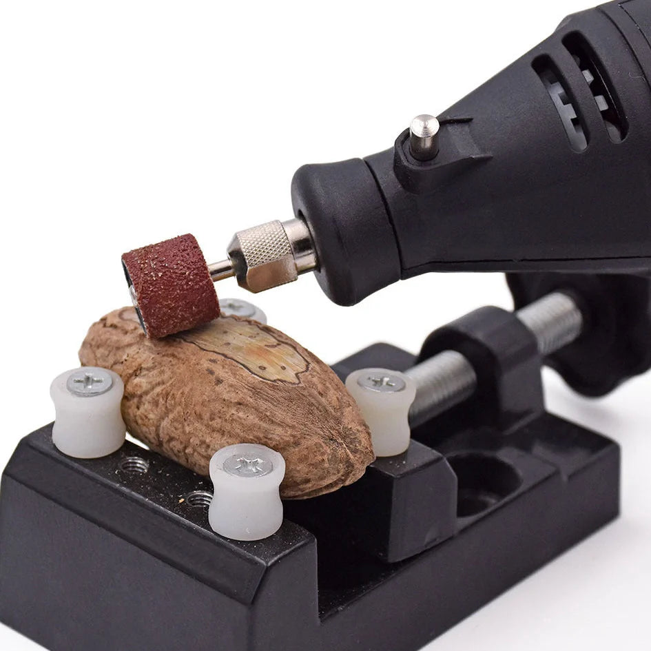 Gold LCD digital hair clipper showing battery percentage display with stainless steel cutting blades