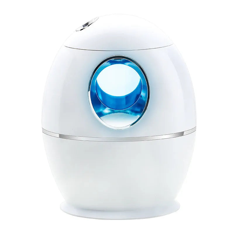 White round USB aromatherapy humidifier with 800ml tank and quiet 36dB operation.