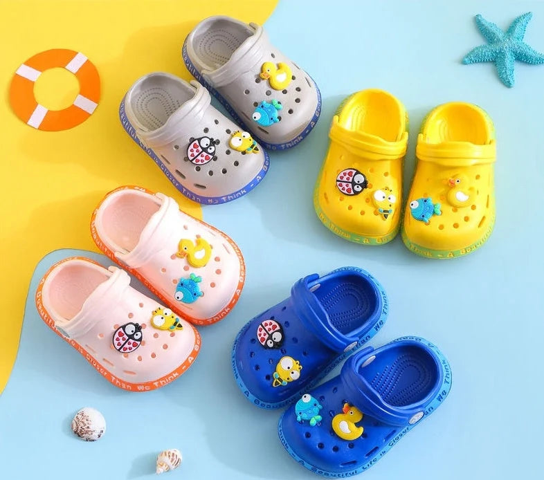 Kids cartoon slippers with animal prints in yellow, grey, sky blue, dark blue, and pink