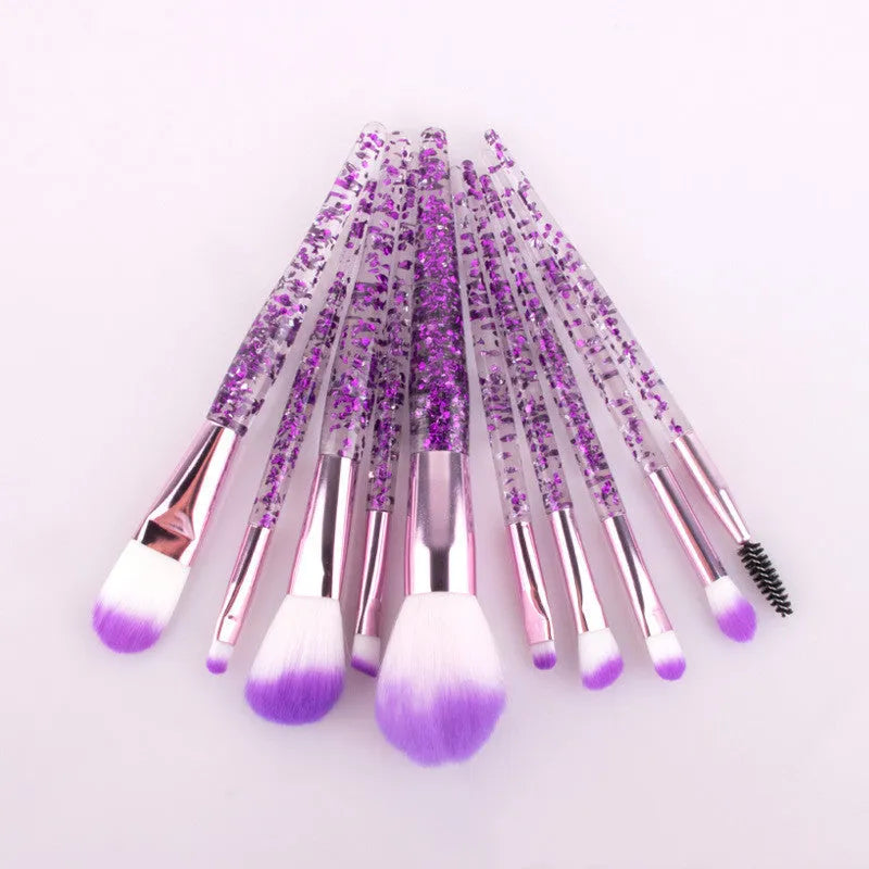 10 makeup brushes with pink powder-filled handles and nylon bristles arranged in a fan shape