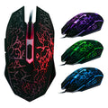 Black wired optical mouse with USB cable, six buttons, and four-way scroll wheel on a desk